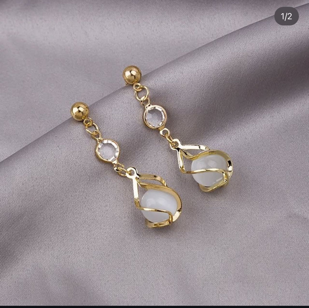 Ladies earrings. Simple looks